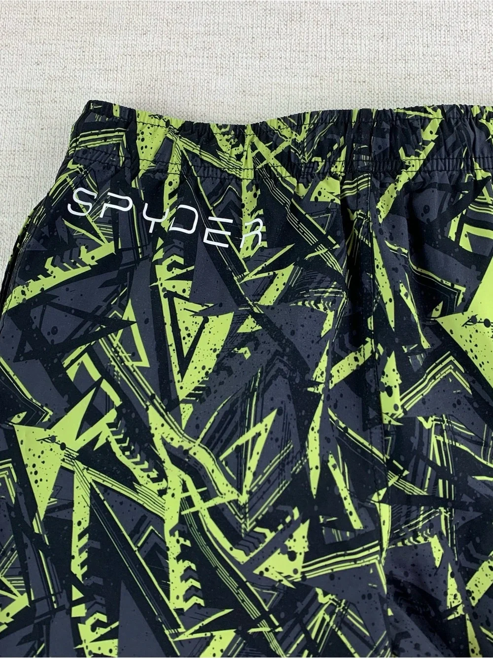 Spyder boy's Black and Neon Green Geometric print Swim Trunks size M(10-12)